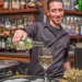 Taddeos-Bartender-Pouring-white-wine