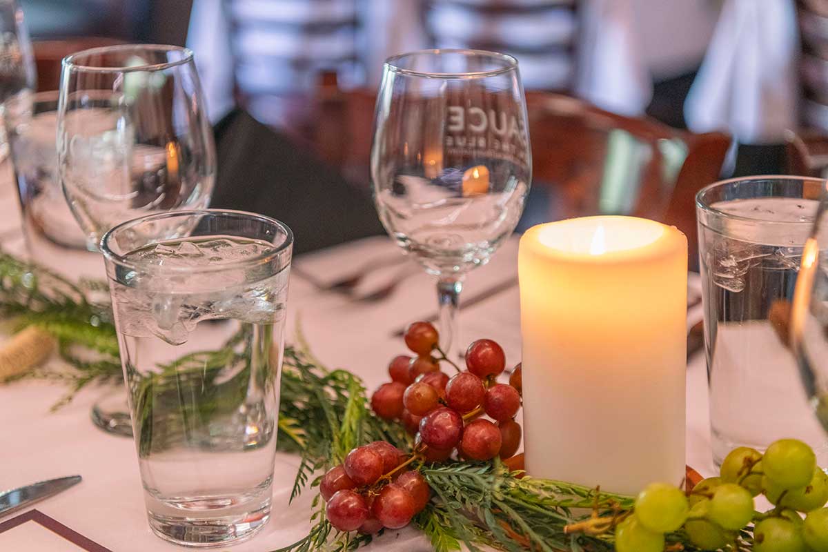 Banquet table closeup with candle